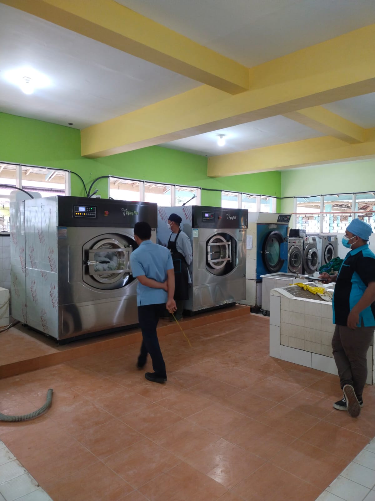 Project instalasi mesin laundry komersial